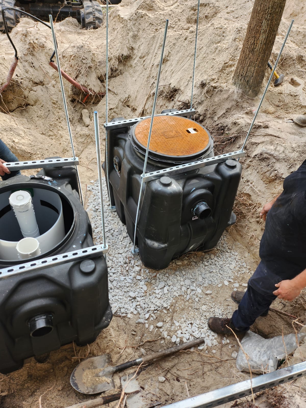 Grease trap tank installation in excavation