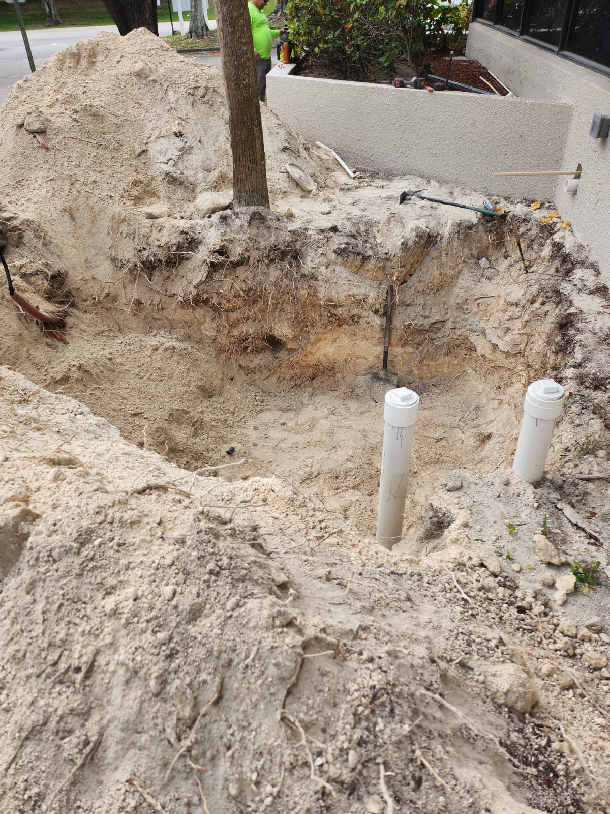 Excavated area for grease trap installation